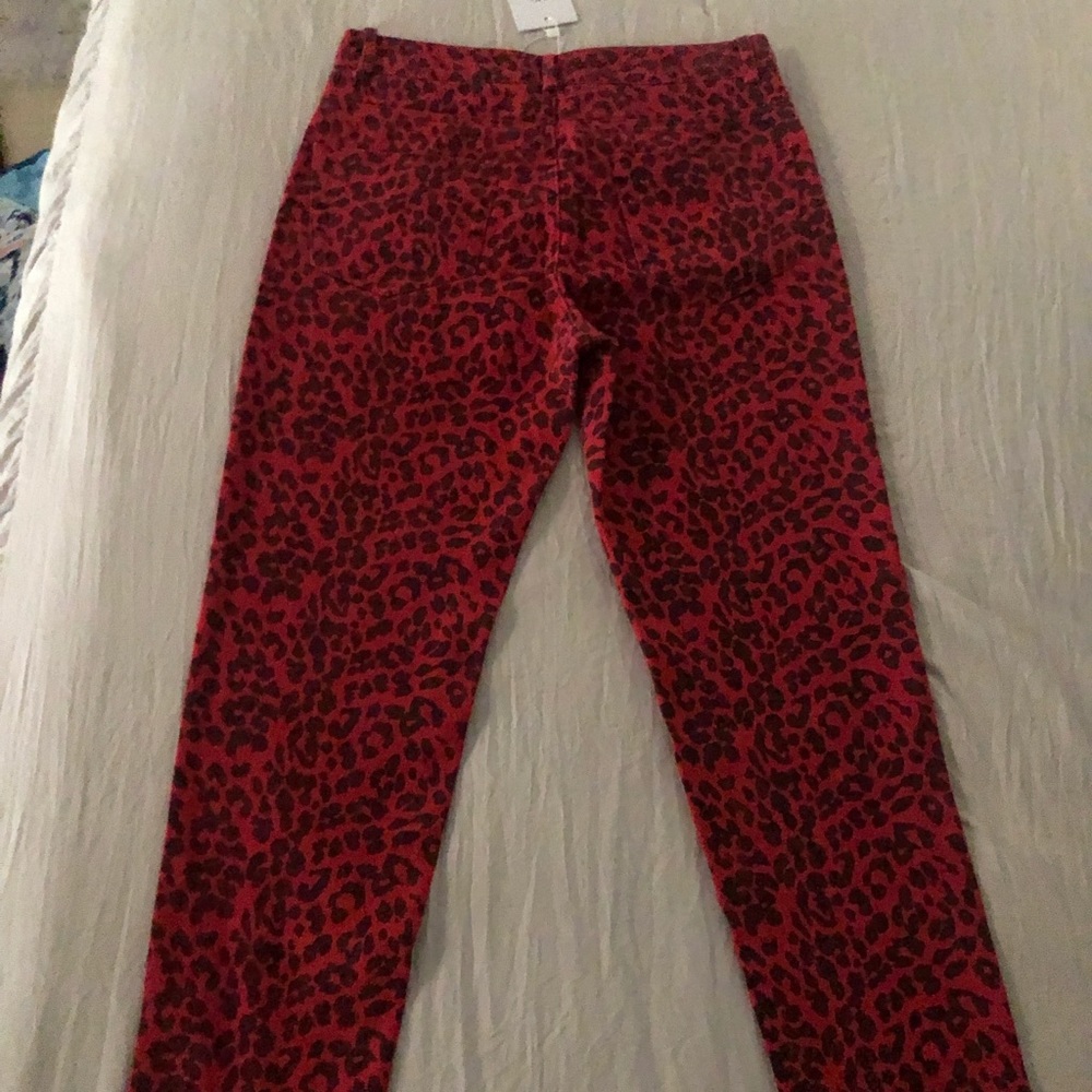Adika red & black cheetah pants/jeans. Brand new.
